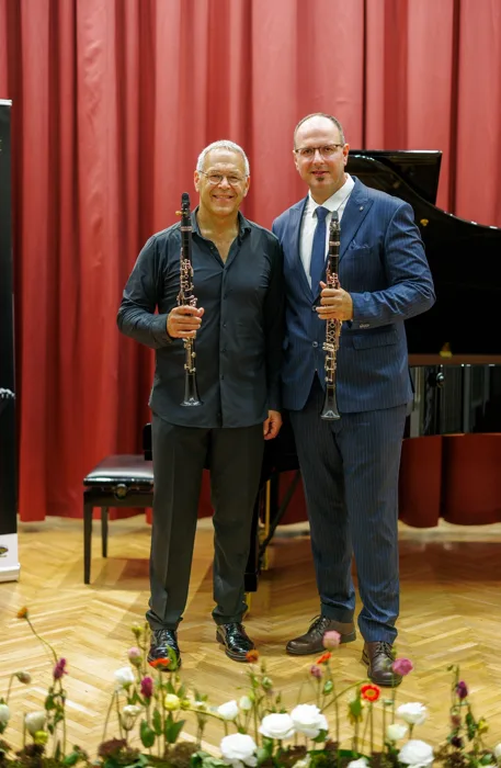 Two voices, one language